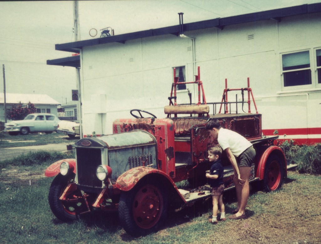 Warren Brown age three (1968), with a 1920s  Dennis fire engine.