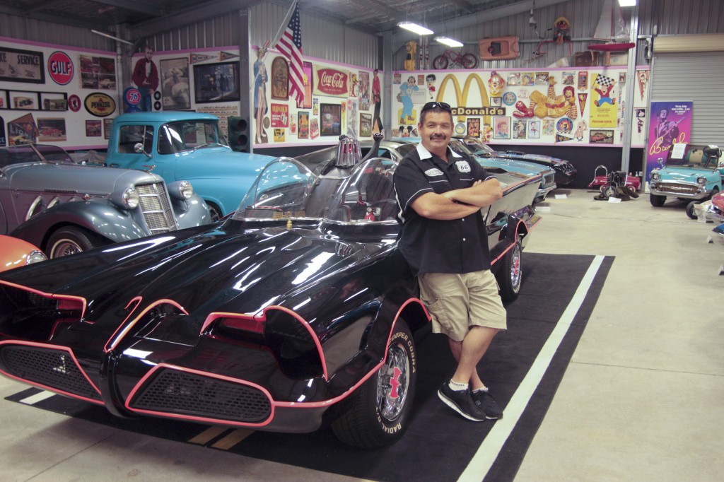 Glen Jennings posing with his Batmobile. 